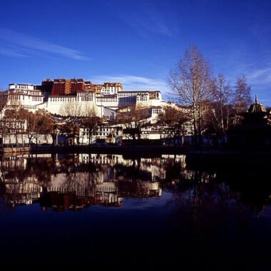 Potala Palace in Tibet - reflected in a garden lake