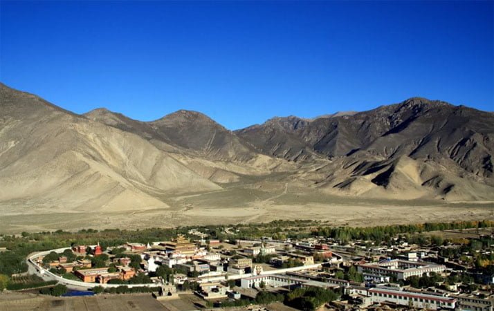 The Samye Monastery complex, with its distinctive architecture and surrounding landscape.