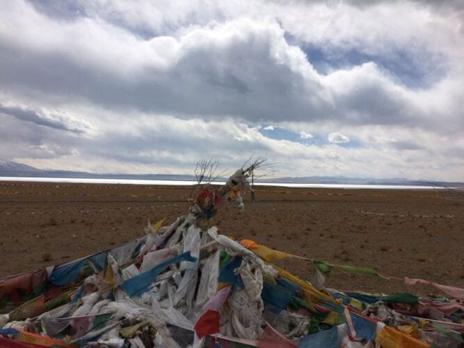 Prayer Flags and Lake Manasarovar in distance