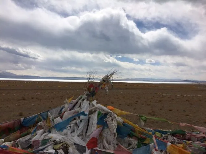 Prayer Flags and Lake Manasarovar in distance
