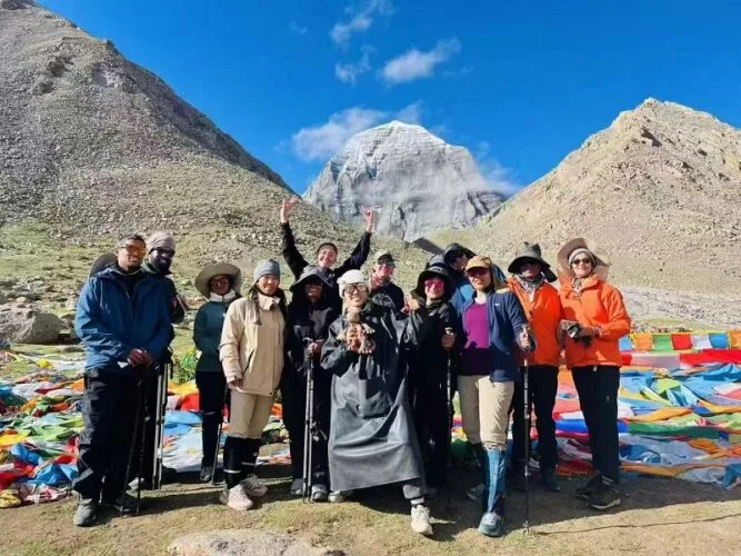 tibet tour experts' guests and guides in front of Mt. Kailash